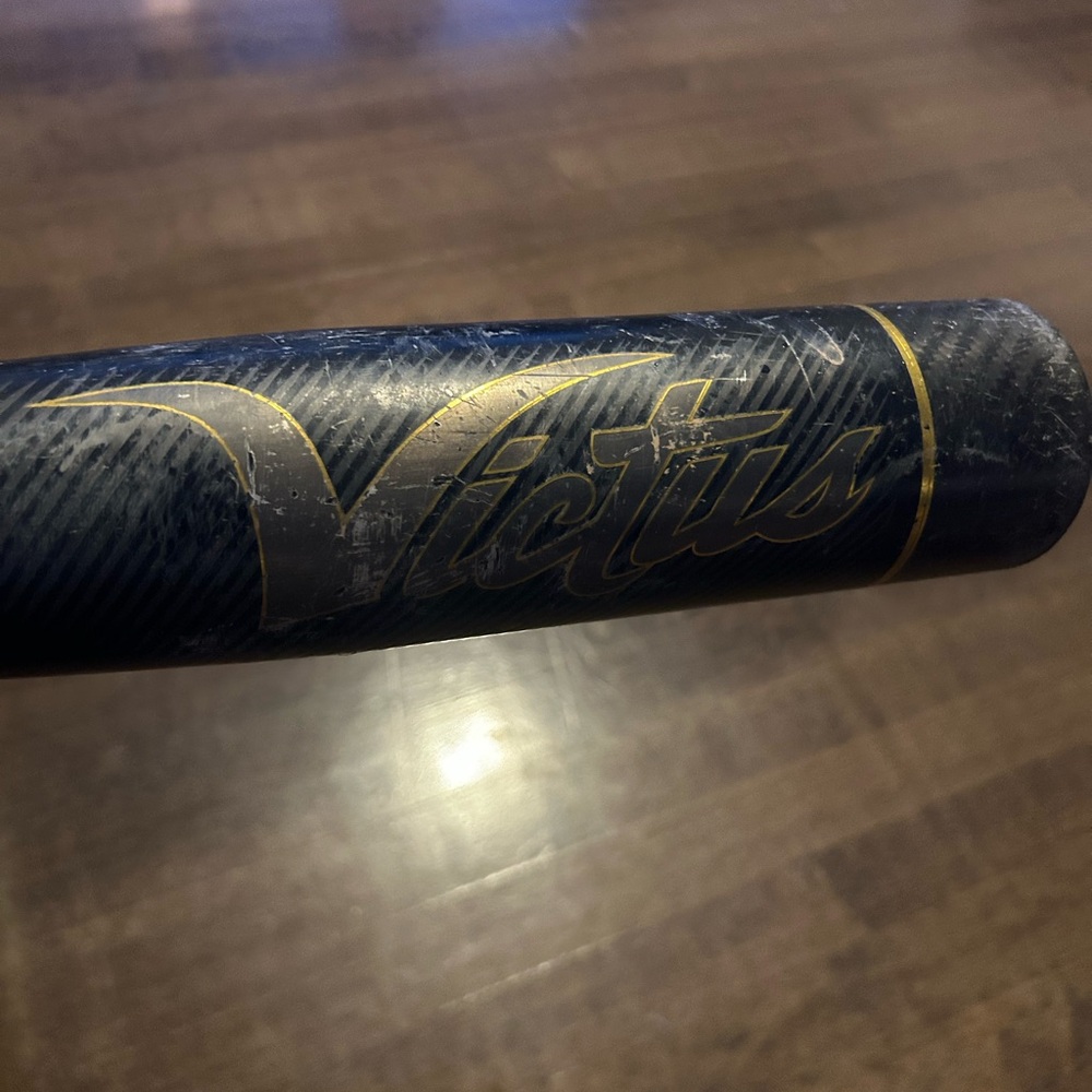 Victus Baseball Bat with Gold Accents